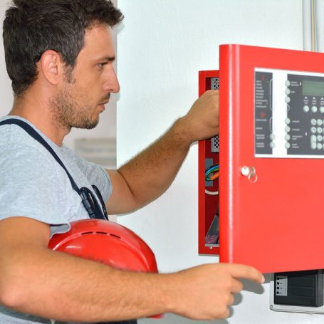 Licensed Technician Checking Fire Alarm Panel